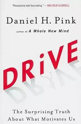 Book cover.  Red text says, "Drive" in the middle of the cover.  "Daniel H. Pink" appears in black text.